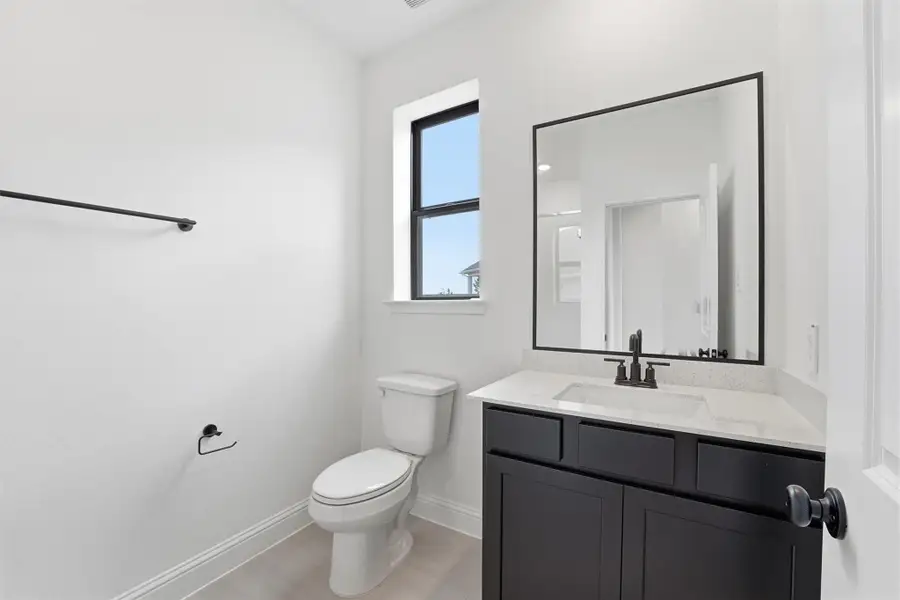 Furnished interior view inside a new home in Bridgeland, Cypress (Image 4).