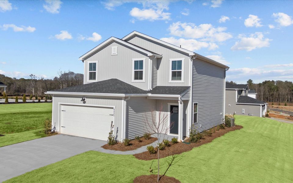 Front exterior of a new home in Crestview, Spartanburg, SC, highlighting curb appeal (Image 17). Front exterior of a new home in Crestview, Spartanburg, SC, highlighting curb appeal (Image 17).