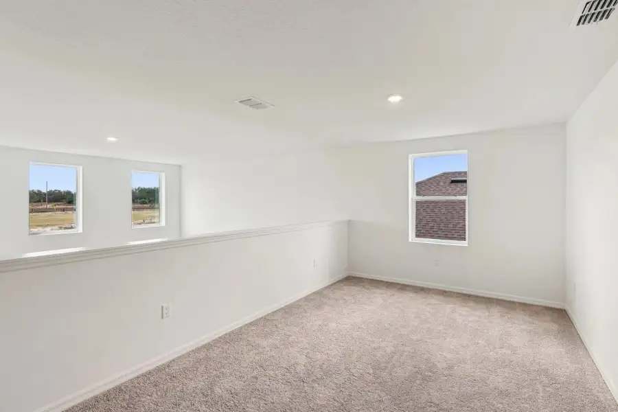 Spacious, unfurnished interior of a new home in Northlake at Ovation, Winter Garden (Image 23).