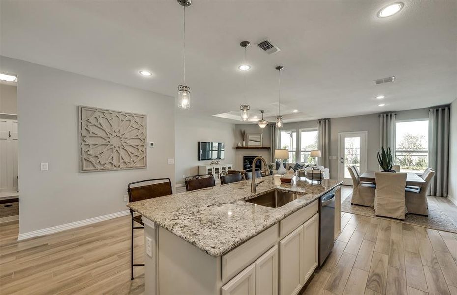 *Actual home, furniture not included - Large island overlooking gathering room and dining areas