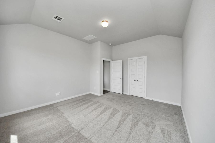 Come and unwind after a long day in this magnificent primary suite! This spacious room features plush carpet, warm paint, high ceilings and large windows with privacy blinds. Come and unwind after a long day in this magnificent primary suite! This spacious room features plush carpet, warm paint, high ceilings and large windows with privacy blinds.