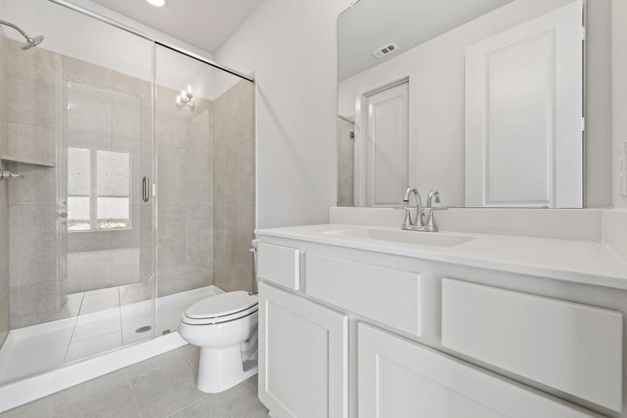 Furnished interior view inside a new home in Bridgeland, Cypress (Image 5).