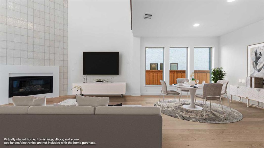 Living room featuring a fireplace and hardwood / wood-style floors