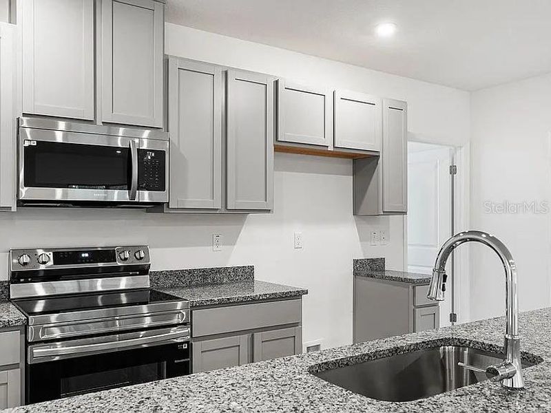 Furnished interior view inside a new home in Royal Highlands, Brooksville (Image 13).