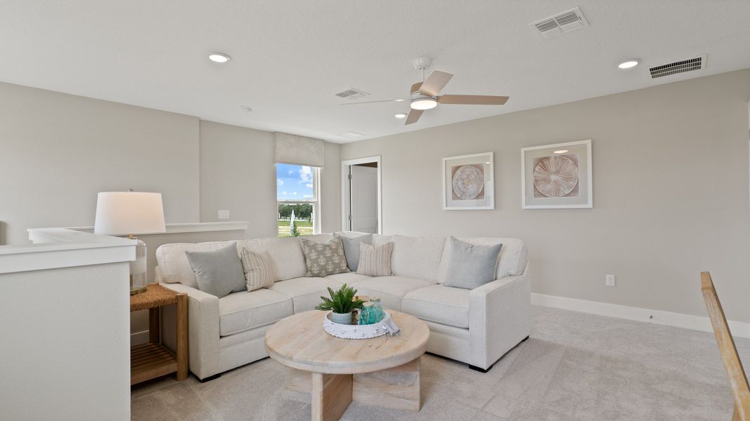 Representative furnished interior of a home built from the Sweetgum by DRB Homes in Trailside, Mount Dora (Image 60).