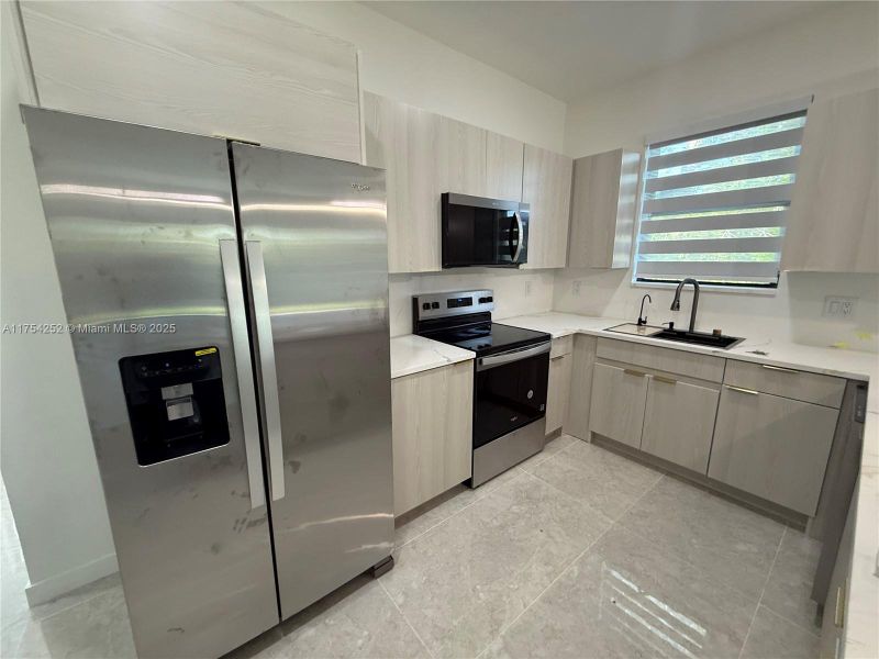 Furnished interior view inside a new home in , Punta Gorda (Image 35).