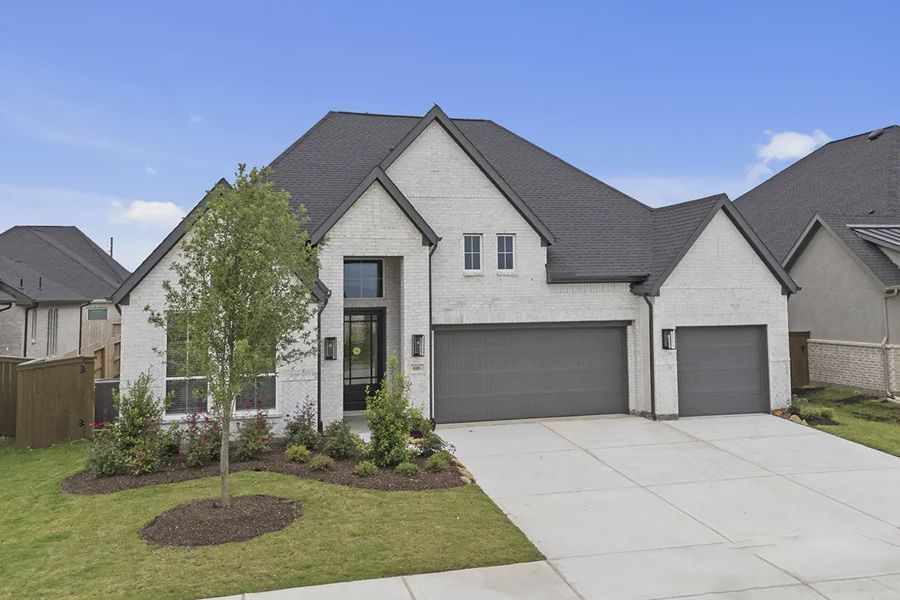 Front exterior of a new home in Attwater 65's, Waller, TX, highlighting curb appeal (Image 22).