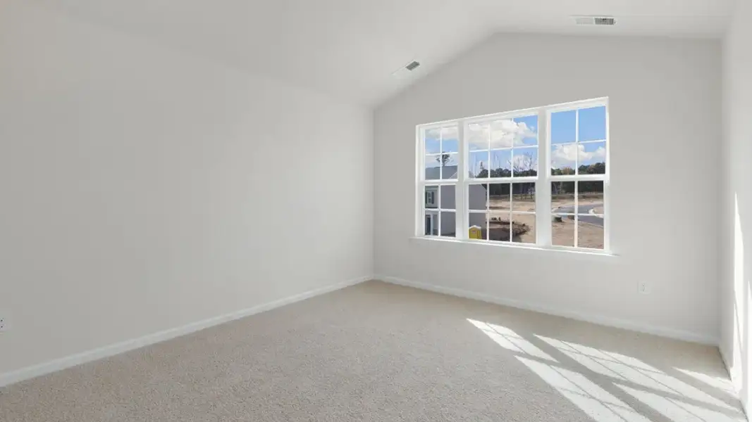 Spacious, unfurnished interior of a new home in The Townes at Galvins Ridge, Sanford (Image 25).