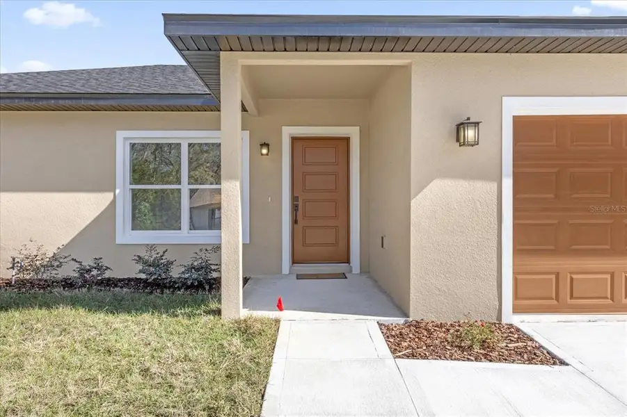 Exterior details and patio area of a home in , Belleview (Image 2). Exterior details and patio area of a home in , Belleview (Image 2).