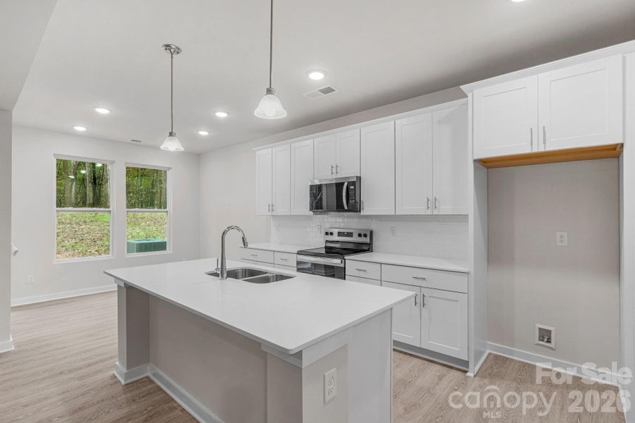 Furnished interior view inside a new home in , Monroe (Image 11).
