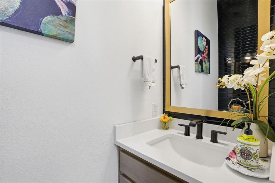 Bathroom featuring vanity Bathroom featuring vanity