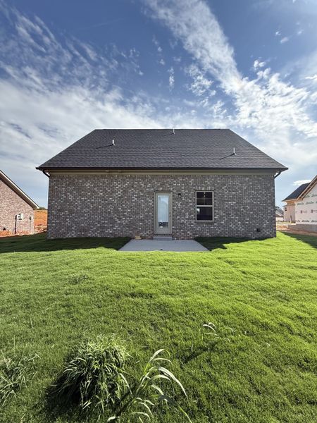 Front exterior of a new home in Bradley Bend, Ashland City, TN, highlighting curb appeal (Image 2).