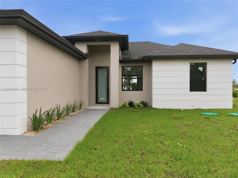 Exterior details and patio area of a home in , Lehigh Acres (Image 4).