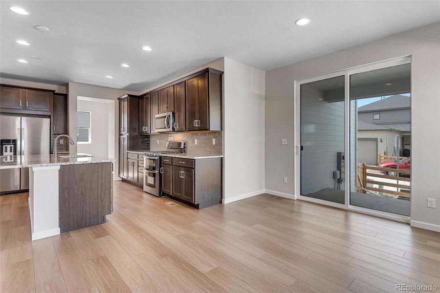 Furnished interior view inside a new home in Crescendo Collection at Reunion, Commerce City (Image 5). Furnished interior view inside a new home in Crescendo Collection at Reunion, Commerce City (Image 5).