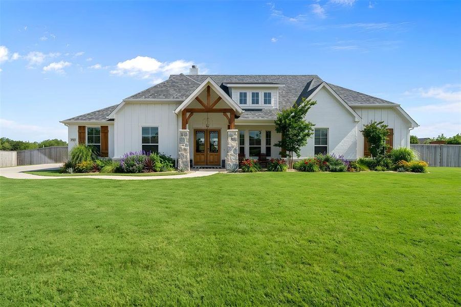 Front exterior of a new home in Jordan Run, Midlothian, TX, highlighting curb appeal (Image 20).