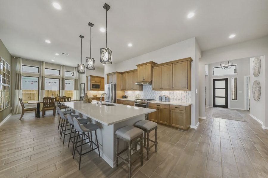 Representative furnished interior of a home built from the Somervell by Chesmar Homes in Meridiana 50's and 60's, Manvel (Image 6).