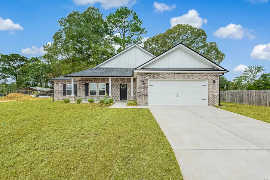 Front exterior of a new home in Barton's Bend, Crestview, FL, highlighting curb appeal (Image 2). Front exterior of a new home in Barton's Bend, Crestview, FL, highlighting curb appeal (Image 2).