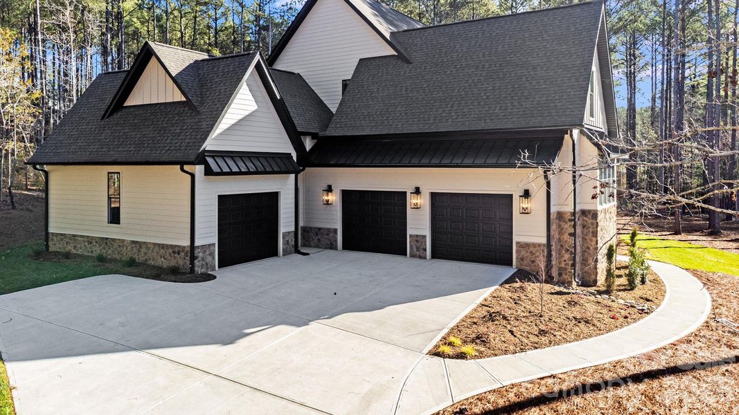Front exterior of a new home in , Lancaster, SC, highlighting curb appeal (Image 28).