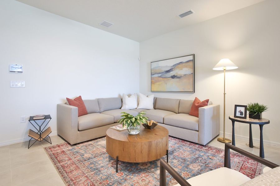 Representative furnished interior of a home built from the Morgan by Neal Communities in SkySail, Naples (Image 30).