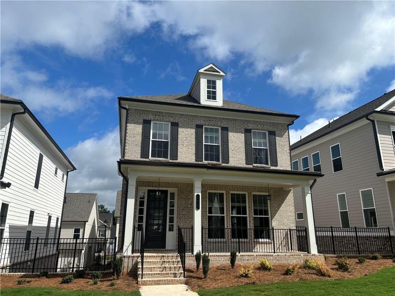 Front exterior of a new home in Brackley Single Family, Cumming, GA, highlighting curb appeal (Image 28).