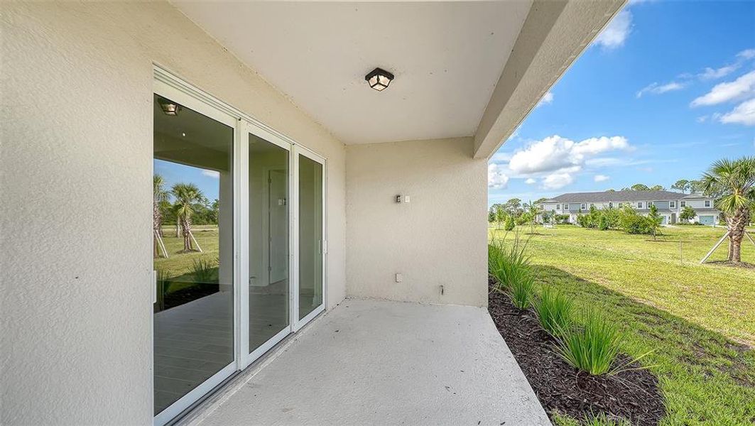 Exterior details and patio area of a home in Grand Park, Sarasota (Image 19).