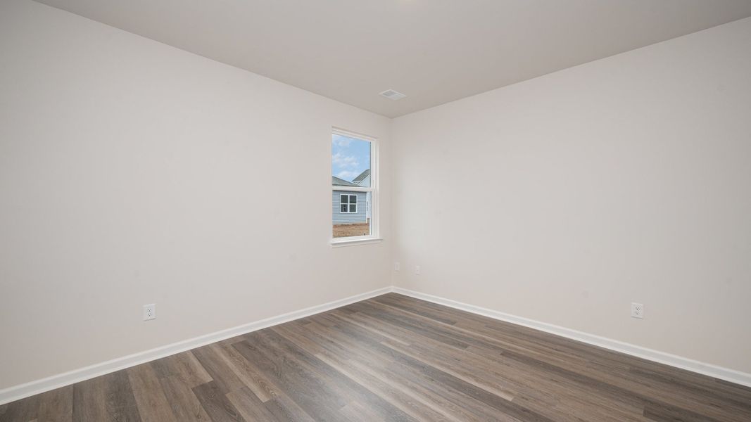 Spacious, unfurnished interior of a new home in Indigo Preserve, Leland (Image 15).