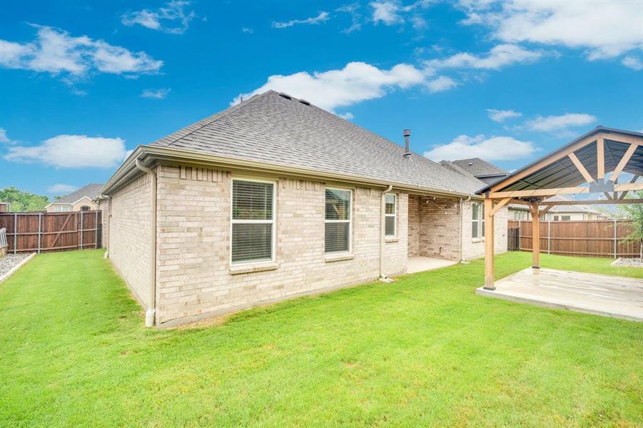 Exterior details and patio area of a home in Westside Preserve, Midlothian (Image 4).