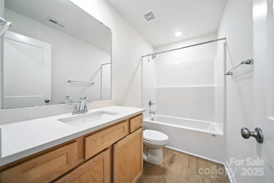 Furnished interior view inside a new home in , Hickory (Image 16).