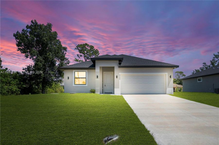 Front exterior of a new home in , Labelle, FL, highlighting curb appeal (Image 22). Front exterior of a new home in , Labelle, FL, highlighting curb appeal (Image 22).