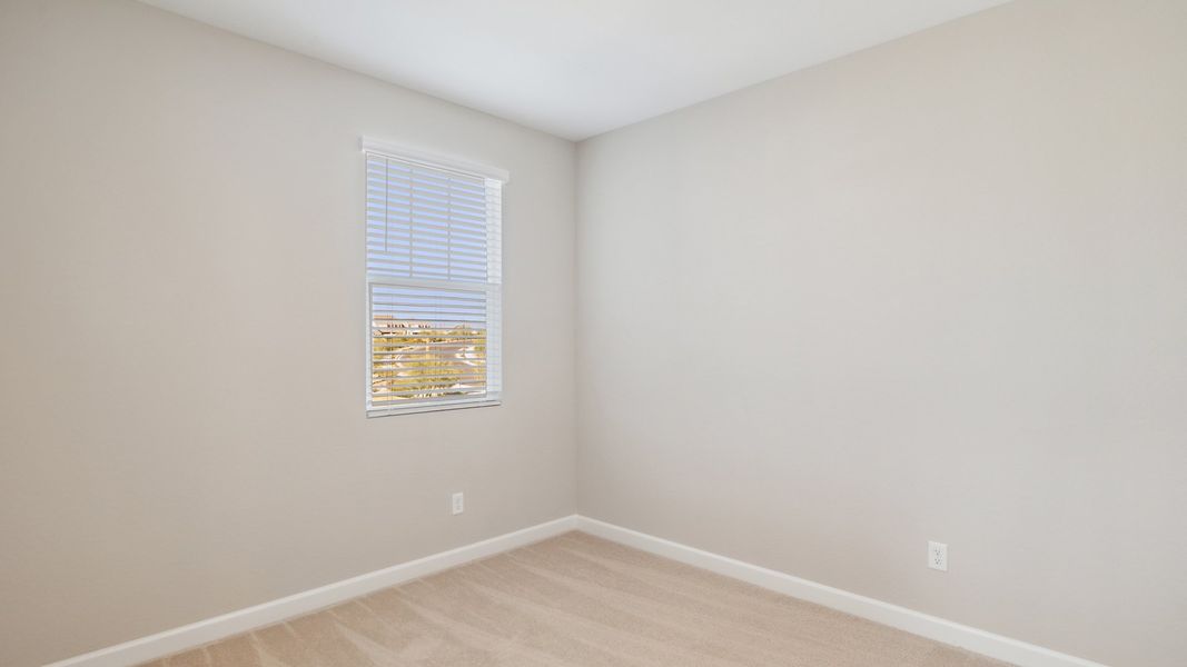 Spacious, unfurnished interior of a new home in Talinn Towns at Desert Ridge, Phoenix (Image 22).