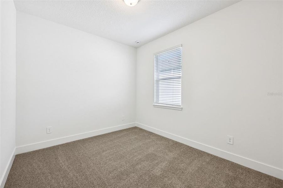 Spacious, unfurnished interior of a new home in Ridgehaven - Signature Series, Ormond Beach (Image 27).