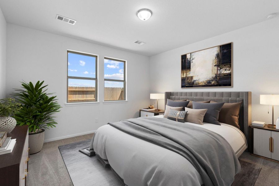 The primary bedroom is generously sized, creating a tranquil and spacious retreat that offers ample room for relaxation. Featuring plush carpet, high ceilings, fresh paint, and large windows that lets in natural lighting throughout the day. The primary bedroom is generously sized, creating a tranquil and spacious retreat that offers ample room for relaxation. Featuring plush carpet, high ceilings, fresh paint, and large windows that lets in natural lighting throughout the day.