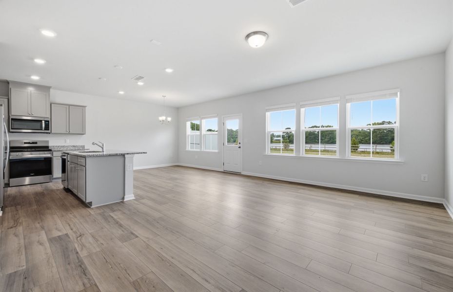 Spacious, unfurnished interior of a new home in Saunders Farm, Willow Spring (Image 15).