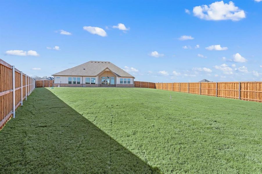Exterior details and patio area of a home in Settlers Glen, New Fairview (Image 3).