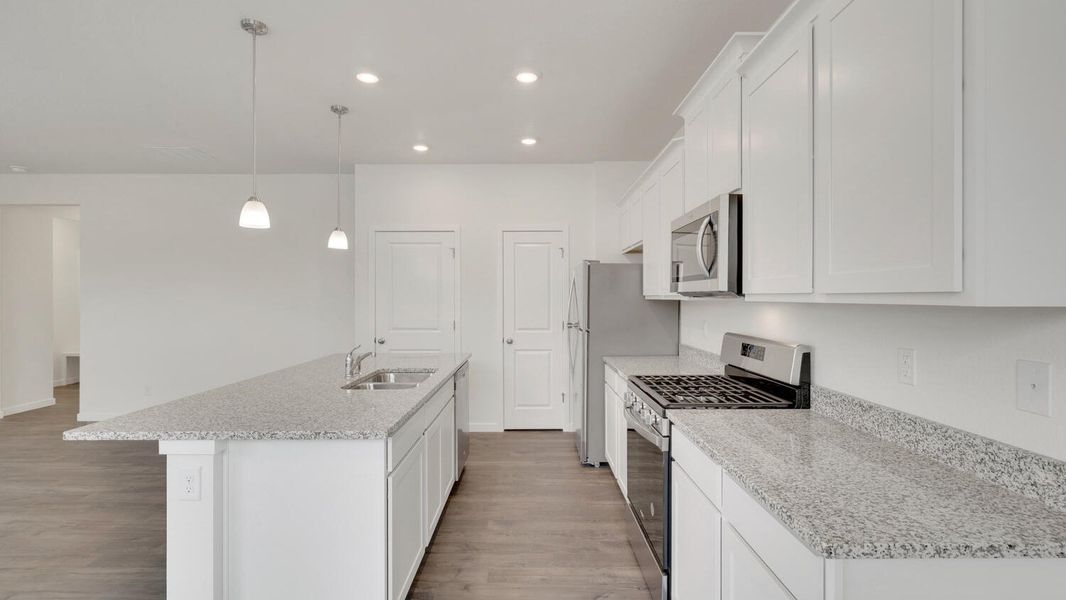 Representative furnished interior of a home built from the Cabral by D.R. Horton in The Ridge at Lorson Ranch, Colorado Springs (Image 6).