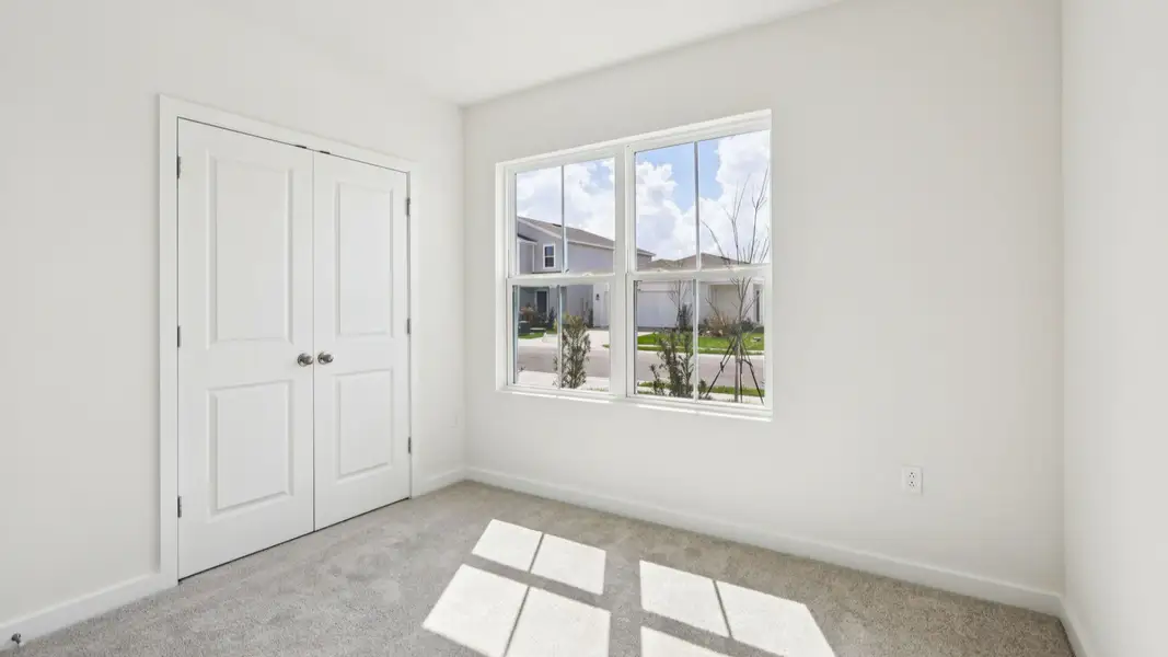 Representative unfurnished interior of a home built from the Baker by DRB Homes in Liberty Trace, Haines City (Image 27).
