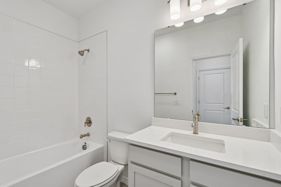 Furnished interior view inside a new home in Baldwin Crossing 16', Orlando (Image 6).