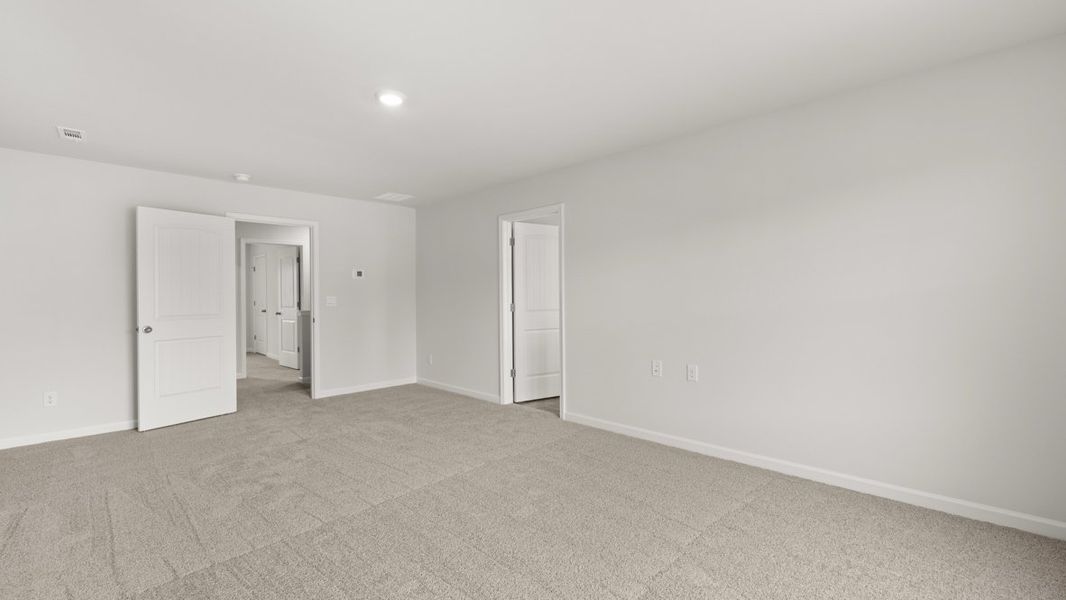 Representative unfurnished interior of a home built from the Hayden by D.R. Horton in Liberty Crossing, Braselton (Image 26).