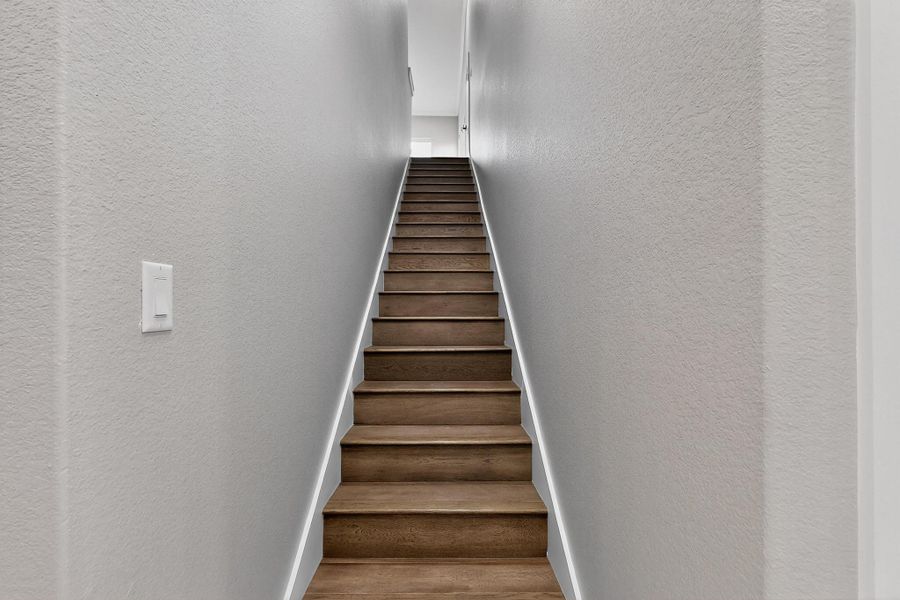 Staircase featuring wood flooring, leading up to bedroom, full bathroom, Staircase featuring wood flooring, leading up to bedroom, full bathroom,