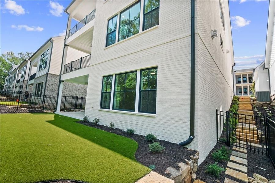Exterior details and patio area of a home in Waterside Single Family, Peachtree Corners (Image 26).
