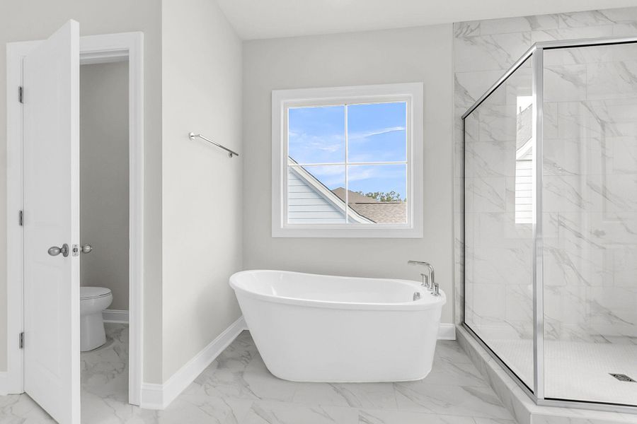 Furnished interior view inside a new home in Tidewater at Lakes of Cane Bay, Summerville (Image 17).