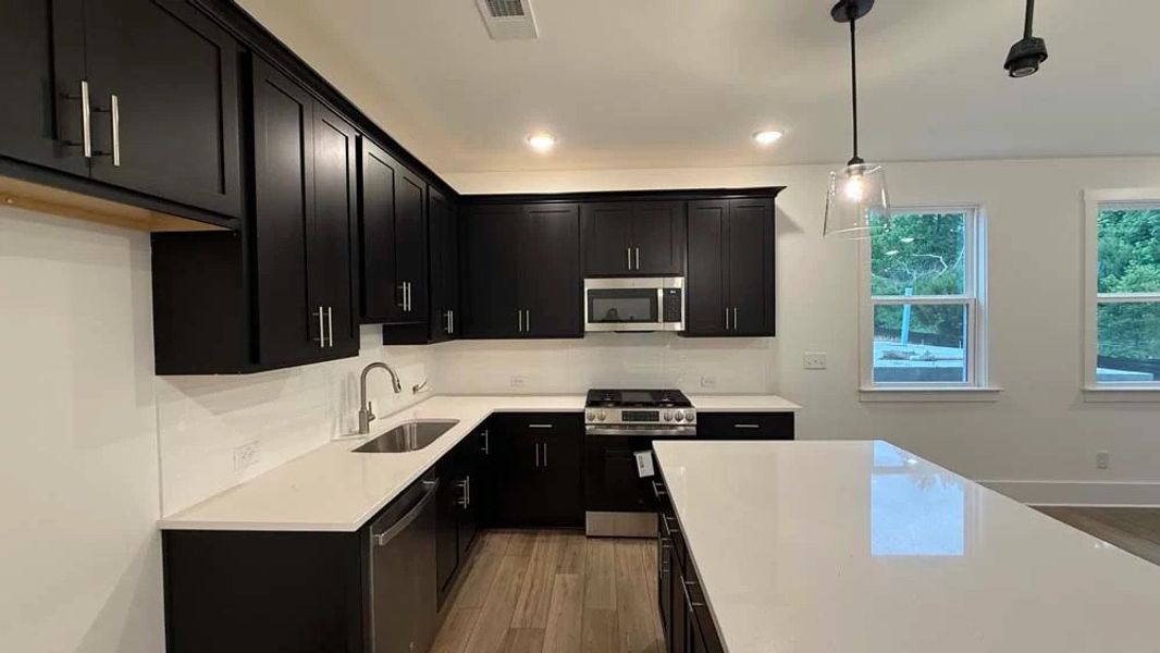 Kitchen featuring Industrial Collection Finishes