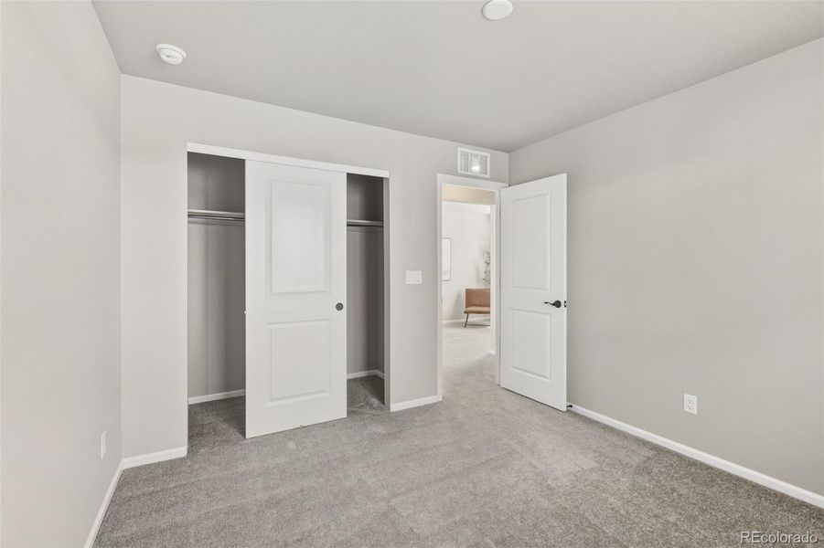 Spacious, unfurnished interior of a new home in Woodrose at Painted Prairie, Aurora (Image 20).