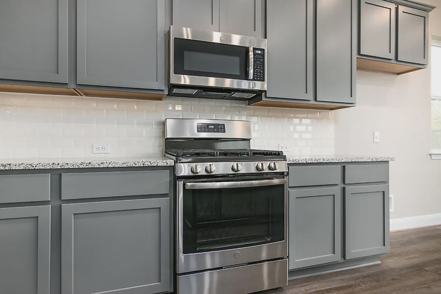 Representative furnished interior of a home built from the Finnigan by Chesmar Homes in Buffalo Crossing, Cibolo (Image 5).