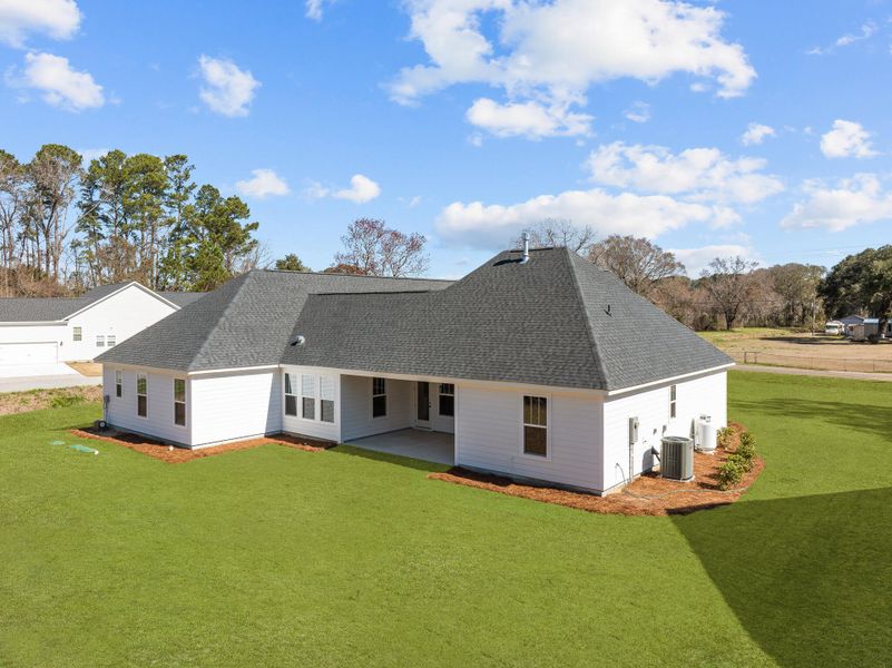 Exterior details and patio area of a home in , Johns Island (Image 2).