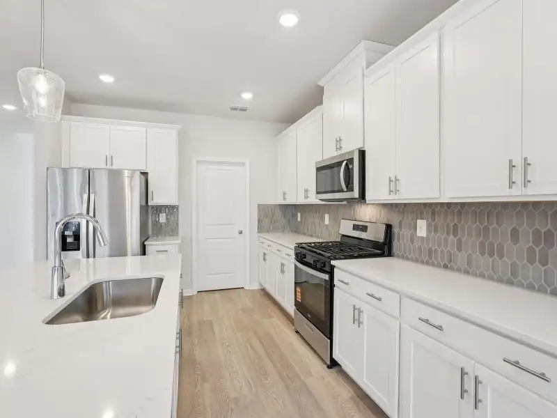 Furnished interior view inside a new home in Harmony Manor, Fairburn (Image 7).