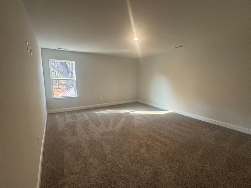 Spacious, unfurnished interior of a new home in The Fields of Walnut Creek, Pendergrass (Image 9).