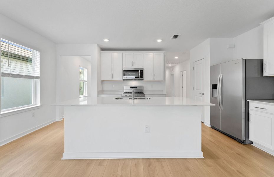 Furnished interior view inside a new home in Twisted Oaks, Wildwood (Image 7).