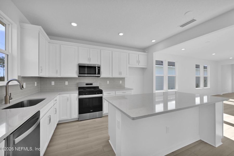 Furnished interior view inside a new home in Del Webb Wildlight, Yulee (Image 10).