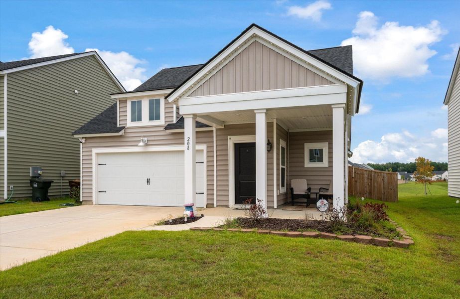 Front exterior of a new home in Cypress Preserve, Moncks Corner, SC, highlighting curb appeal (Image 2). Front exterior of a new home in Cypress Preserve, Moncks Corner, SC, highlighting curb appeal (Image 2).